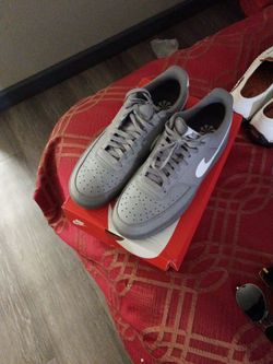 Gray Nikes worn one time