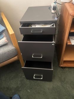 Metal File Cabinet with three drawers. Has Locke and Key  27” high , 14 inch wide, 17” depth…$60