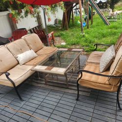 Metal Frame Patio Set With Outdoor Glass Table/ Cushion Is A Little Dirty/ Washable/ Has Zippers