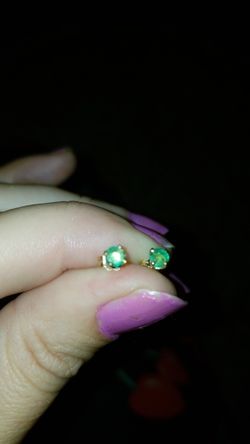 Gold and emerald earrings