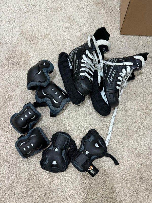 CCM ice Skates and guards Kids Size 12