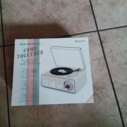 Throwback come together alarm clock with radio with wireless speaker box included