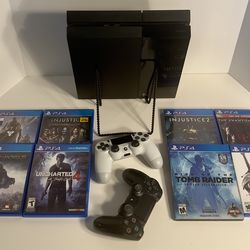 PlayStation 4 CUH-1115A W/2 controllers and Eight Games