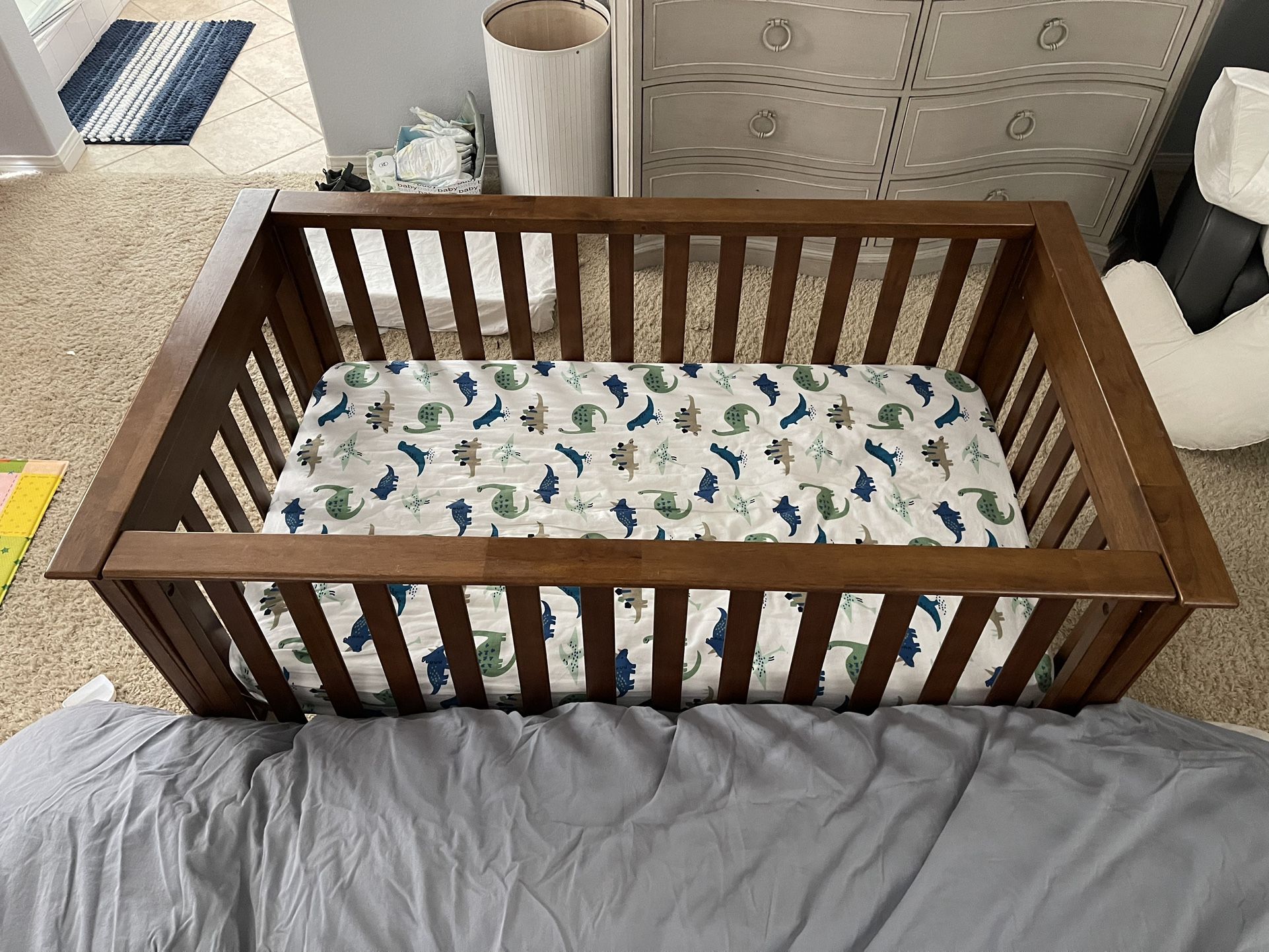 Crib - Wood crib - baby  / toddler bed with mattress and very gently used and in excellent condition  Rarely used - the baby co slept in parents bed  