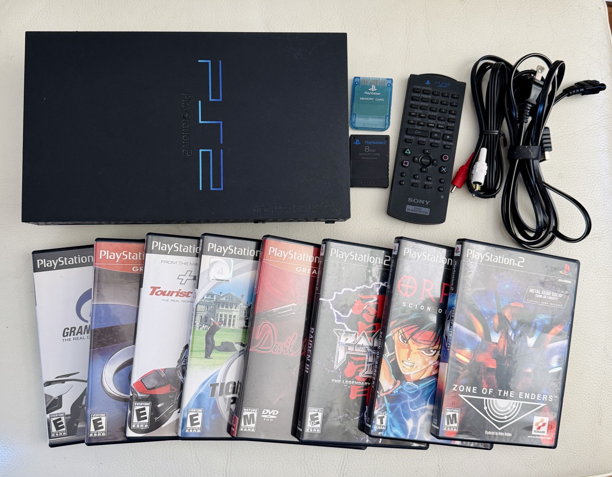 PlayStation 2 PS2 Console and 8 Games Bundle