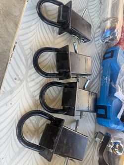 Adjustable tie down system