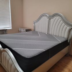 Black king-sized Beauty-rest Mattress.