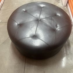 Leather round ottoman W/wheels