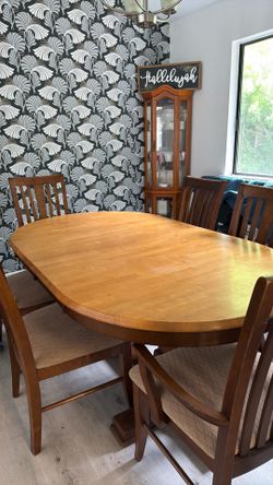 6 chairs with table and hutch