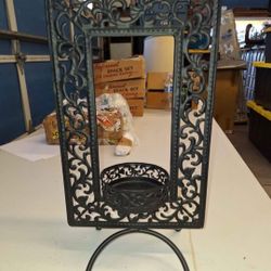 Metal framed candle holder holds up to 3.5 inch diameter candle frame 7.5 inches wide by 14 inches tall A60V350