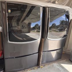 Barely Used LG SIGNATURE 5.8 cu. ft. Washer And 9.0 Cu Ft Dryer 