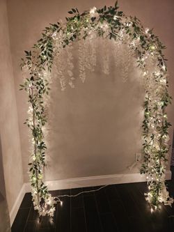 Wedding Arch with lights and flowers