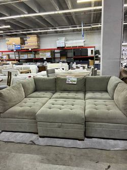Large Gray Modular Sectional Sofa with Ottoman used