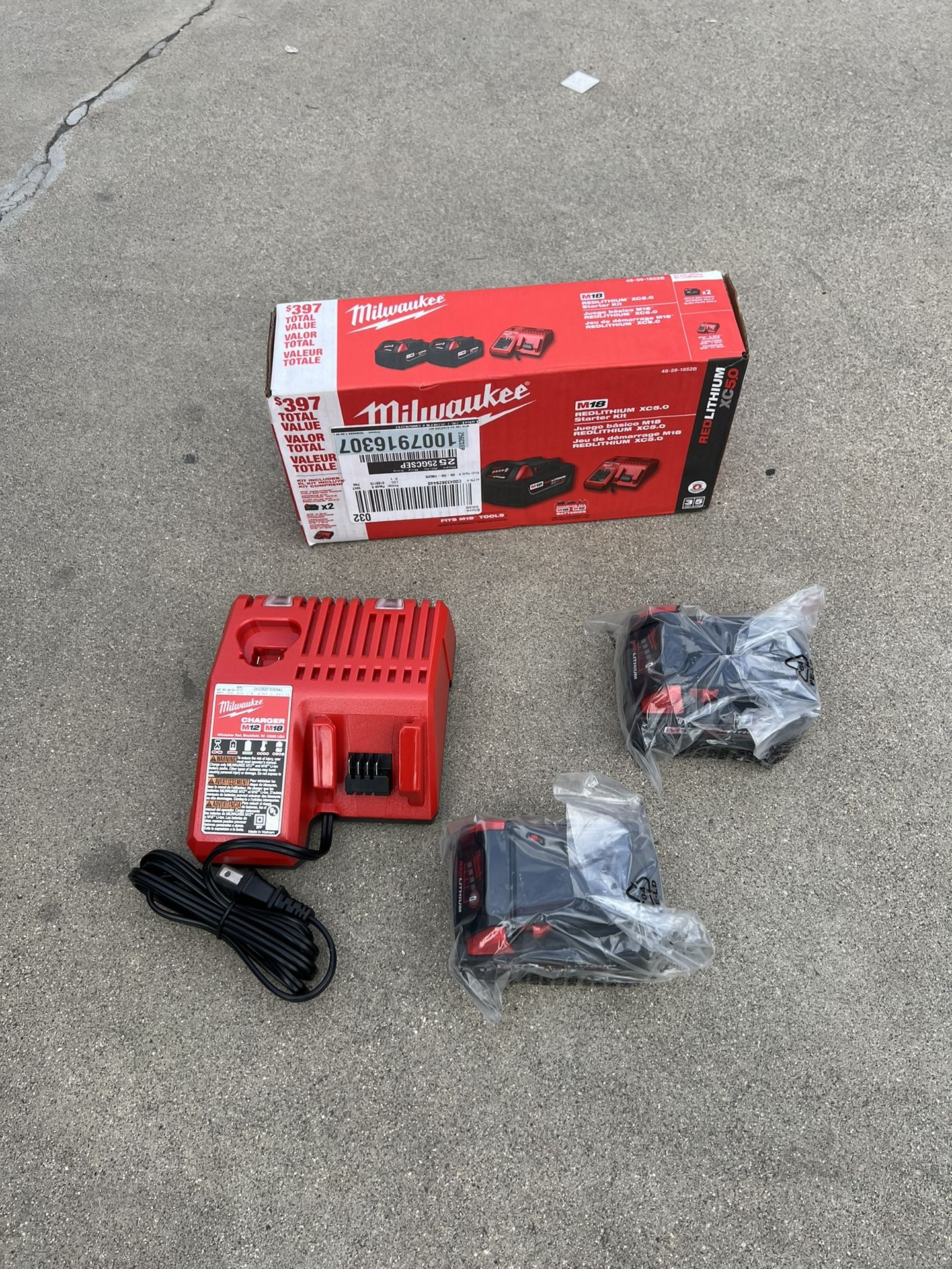 Milwaukee M18 Batteries 5.0 And Charger 