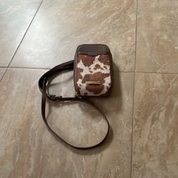 Brown and white cow print crossbody bag