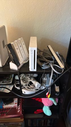 Wii console w/ games and controllers Wii fit