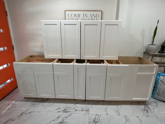Kitchen cabinets  7 total  alpine White $900 NEW NEVER INSTALLED