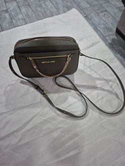 Michael kors seminueva