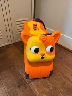 B. toys Ride-On Lolo Toy with Storage.  Press the buttons on Lolo's ears for lights and sounds.