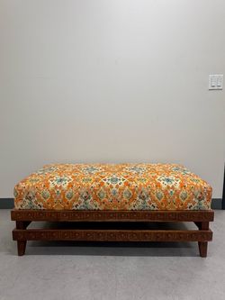 Large Upholstered Ottoman with Carved Wood Base