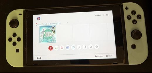 Nintendo Switch Console + Dock + Joy-Cons + Game(Legend of Zelda TOTK) + 128gb SD Card — $200