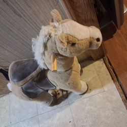 Sit On an sit down horse with wheels.