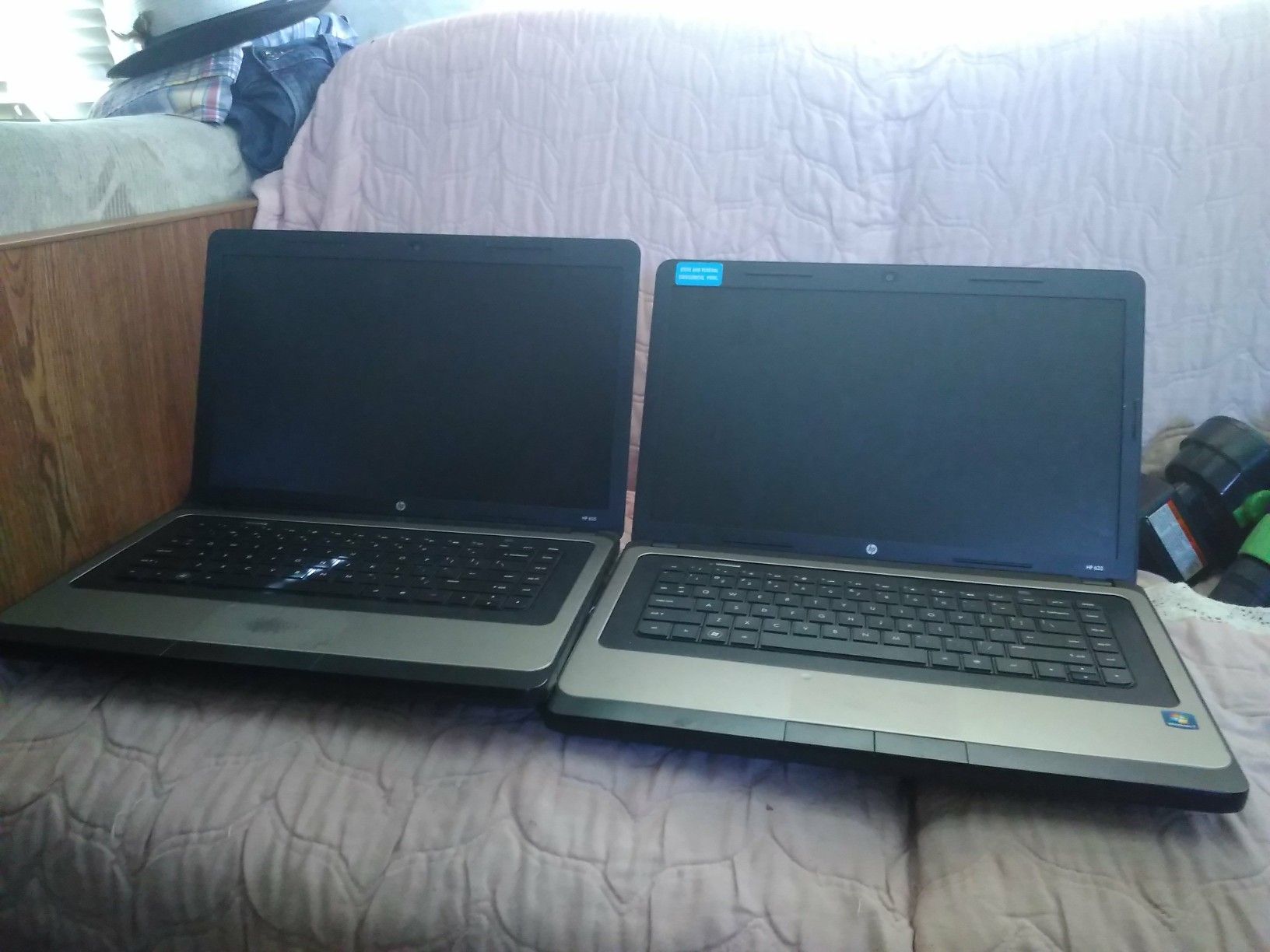 2 hp laptops both work missing covers