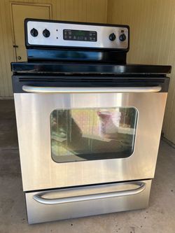 GE stainless steel 30” free standing electric range 4 burner cooktop includes power cable