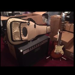 Godin Solidac Electric Guitar, Amplifier and box of Accessories 