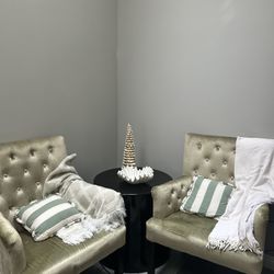 2 green ancient chairs 