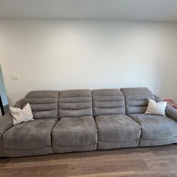 Moving sale - Grey 4-seater Ashley's modular recliner sofa