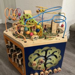 B. toys Wooden Activity Cube