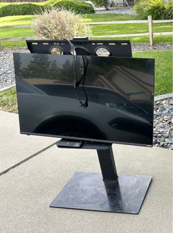 43-in h Vizio Smart TV with media stand and remote