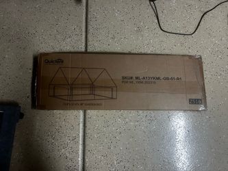 Quictent raised garden bed with a mini greenhouse cover