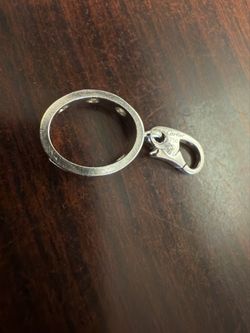 Authentic Cartier 18 karat white gold, diamond charm