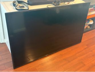Sharp 4K UHD TV w/ Yamaha Speaker Soundbar