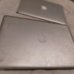2 Apple Laptops