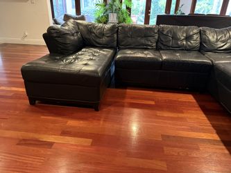 Leather Sectional W/ Chase.
