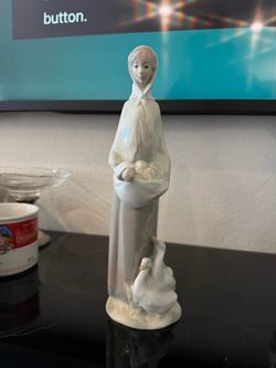 Porcelain Woman with Geese Figurine