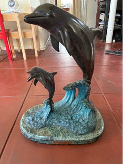 Pride and Joy" bronze sculpture by J. Wyatt