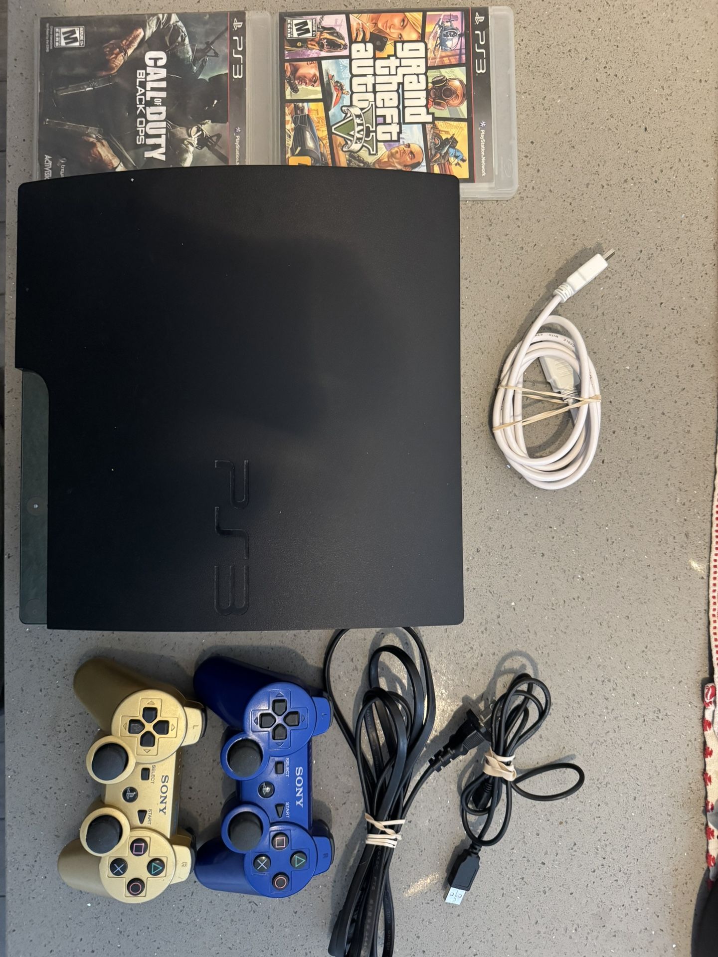 PS3 Slim 160GB Bundle – 2 Controllers + GTA 5 & Black Ops – $140 