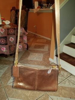 Brown leather coach purse
