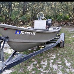 15ft skipjack with 60hp mariner motor with a trailer in good condition fiberglass v haul.