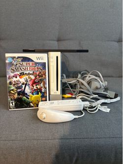 COMPLETE Nintendo Wii with super smash bros brawl and controller