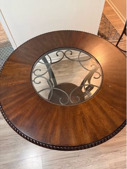 Glass top dining table