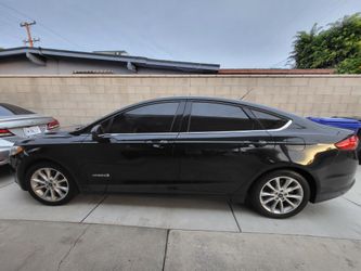 For Sale Or Trade  2017 ford fusion hybrid clean Title 108k miles perfect Condition Smoged  Clean Title Under My Name 