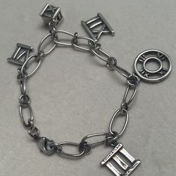 Original Paloma Picasso Tiffany and Co Roman Numeral Charm Bracelet 925 Sterling