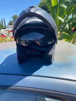 2 motorcycle helmets