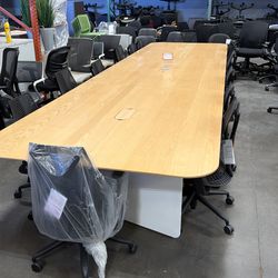 18’feet x 5’feet conference table in a Maple wood veneer top, seats up to 16 people