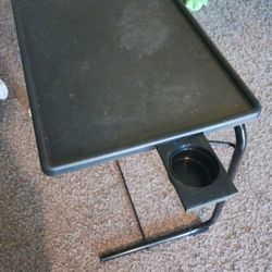 Clean like new adjustable folding table has 3 tilts 6 heights and a cup holder asking $40 must pick up Broadway and apache buckeye az cash only pls th